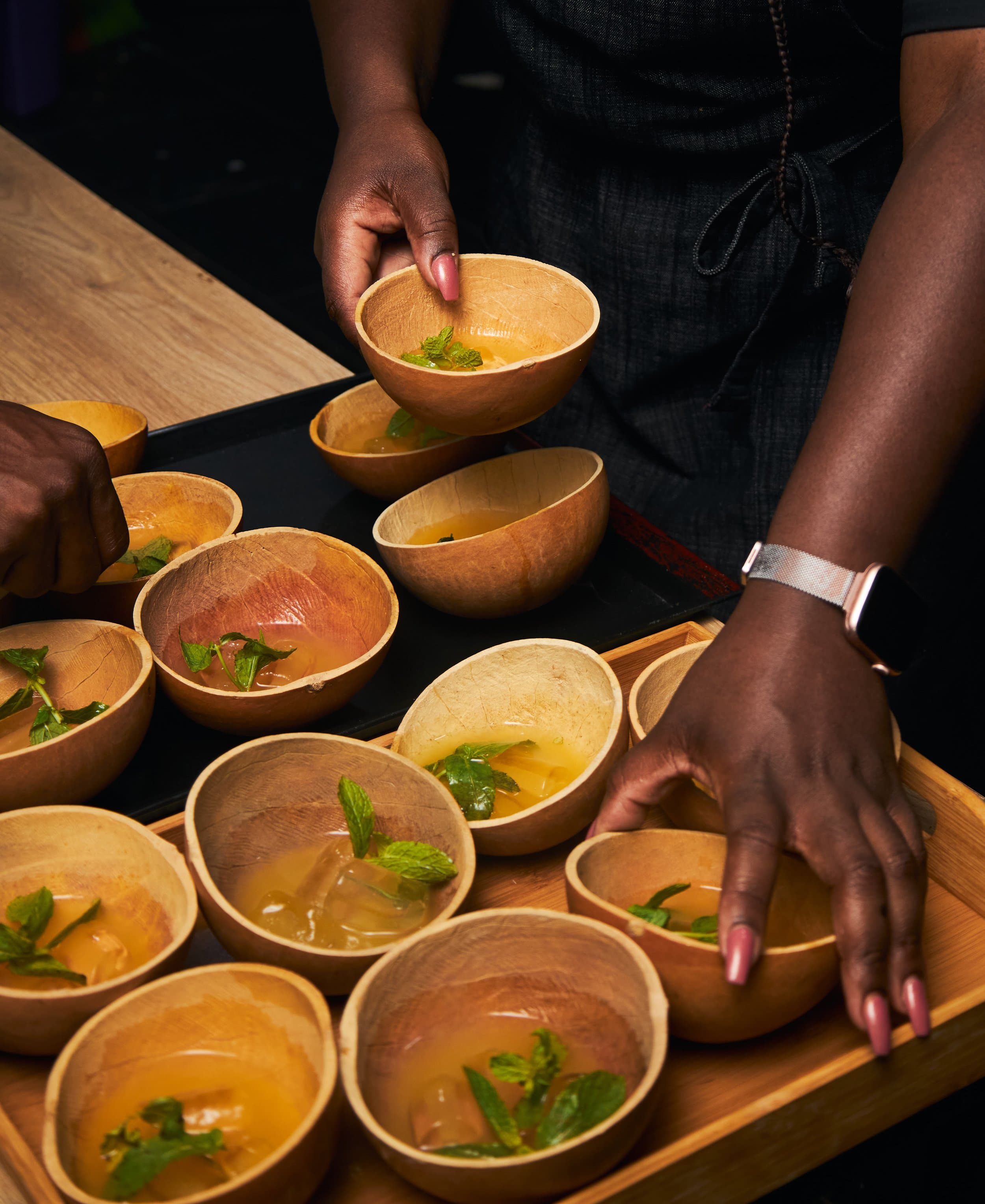 Wooden bowls being plated